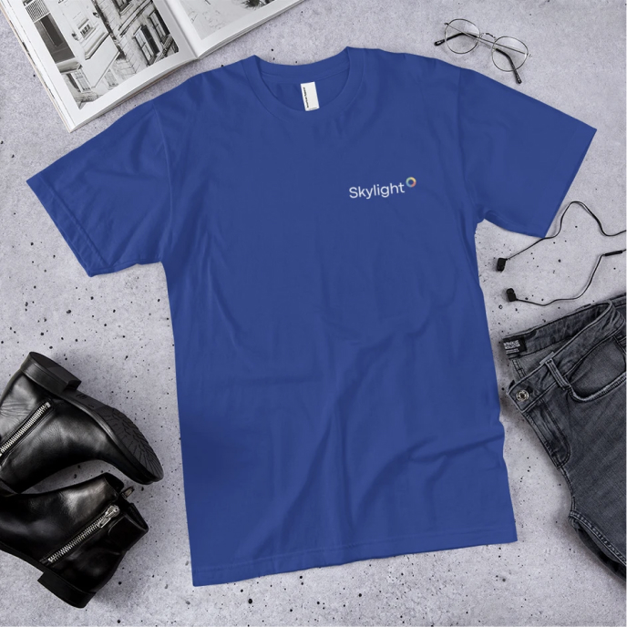 Blue t-shirt with the Skylight logo